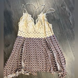 Gimmicks large Lacey flows top. Bought at Buckle. New condition